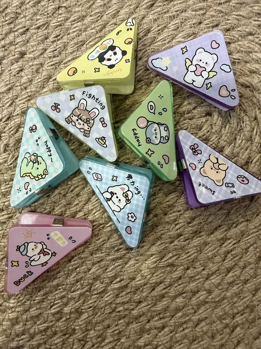 Pastel triangle animal paper clips.