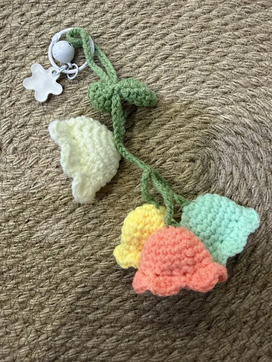 A bell-flower bouquet keychain in several colours.